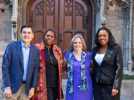 Four Pritzker Fellows smiling and posing for a photo.